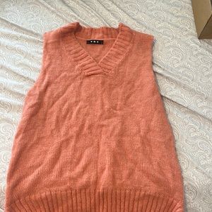 Trendy salmon knit sweater vest!